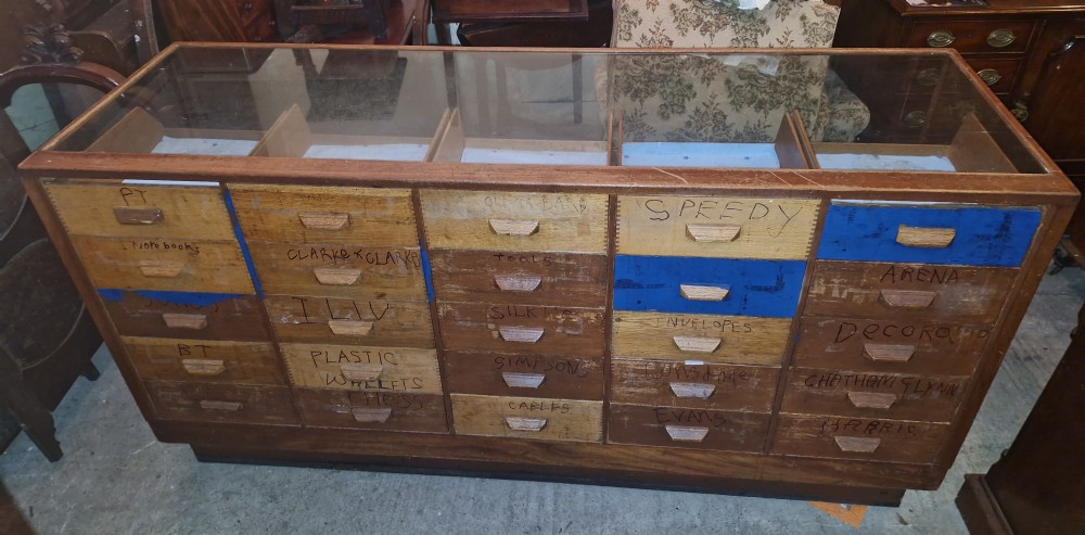1920s 25 drawer oak haberdashery shop cabinet.  View XVI