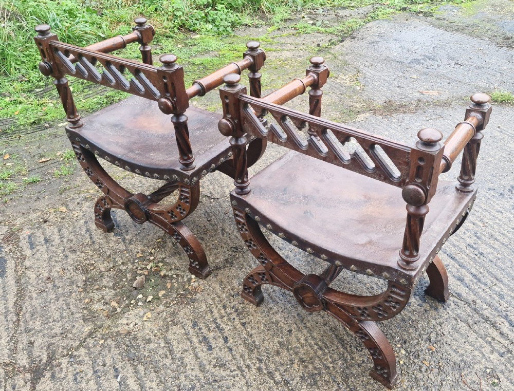 Pair of Late Victorian oak and leather hall armchairs View II