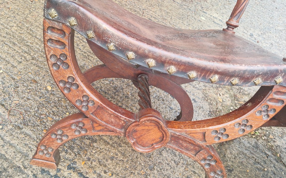 Pair of Late Victorian oak and leather hall armchairs View V