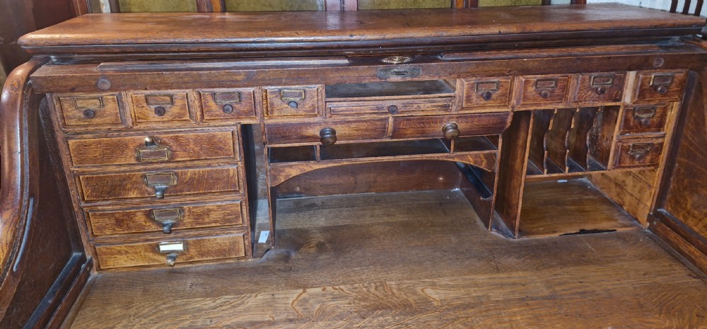 Good large oak roll top pedestal desk. View IV