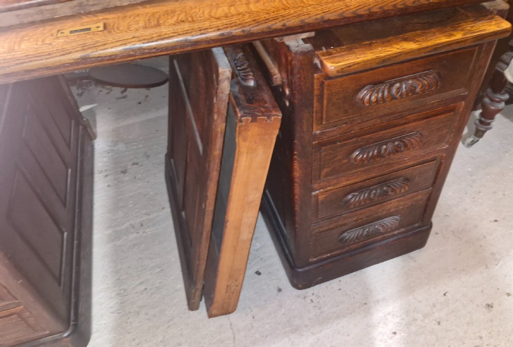 Good large oak roll top pedestal desk. View XI