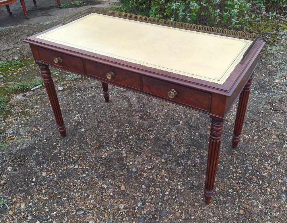 19th century mahogany free standing writing table with dummy drawers to reverse. 