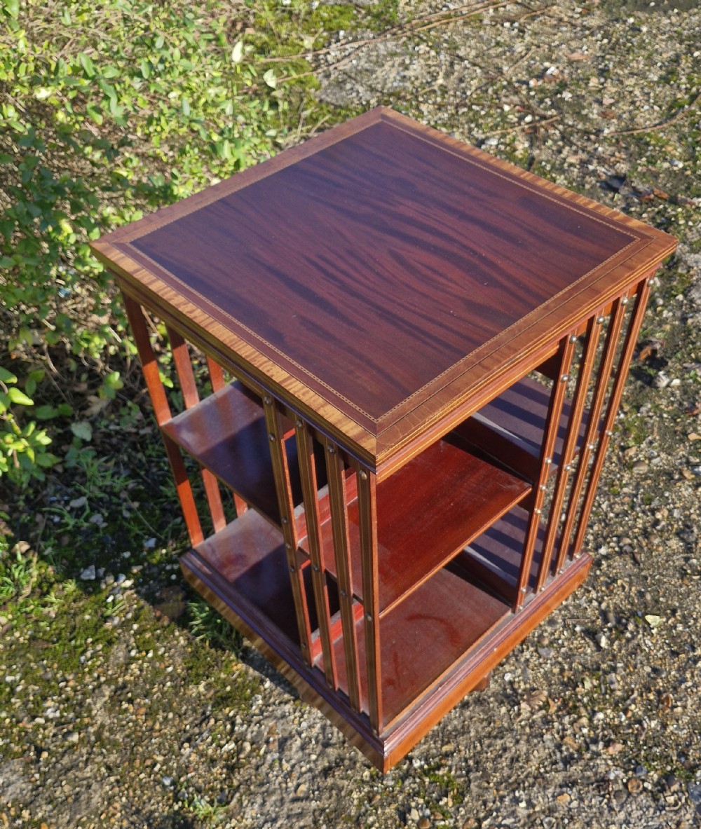 Good Edwardian inlaid mahogany revolving bookcase. 
