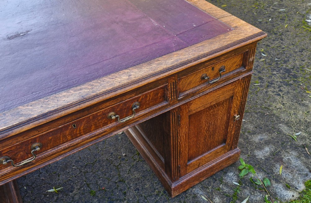 Solid Oak Edwardian pedestal partners desk. View VII
