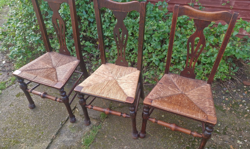 Set of 8 farmhouse rush seat kitchen dining chairs. View IX