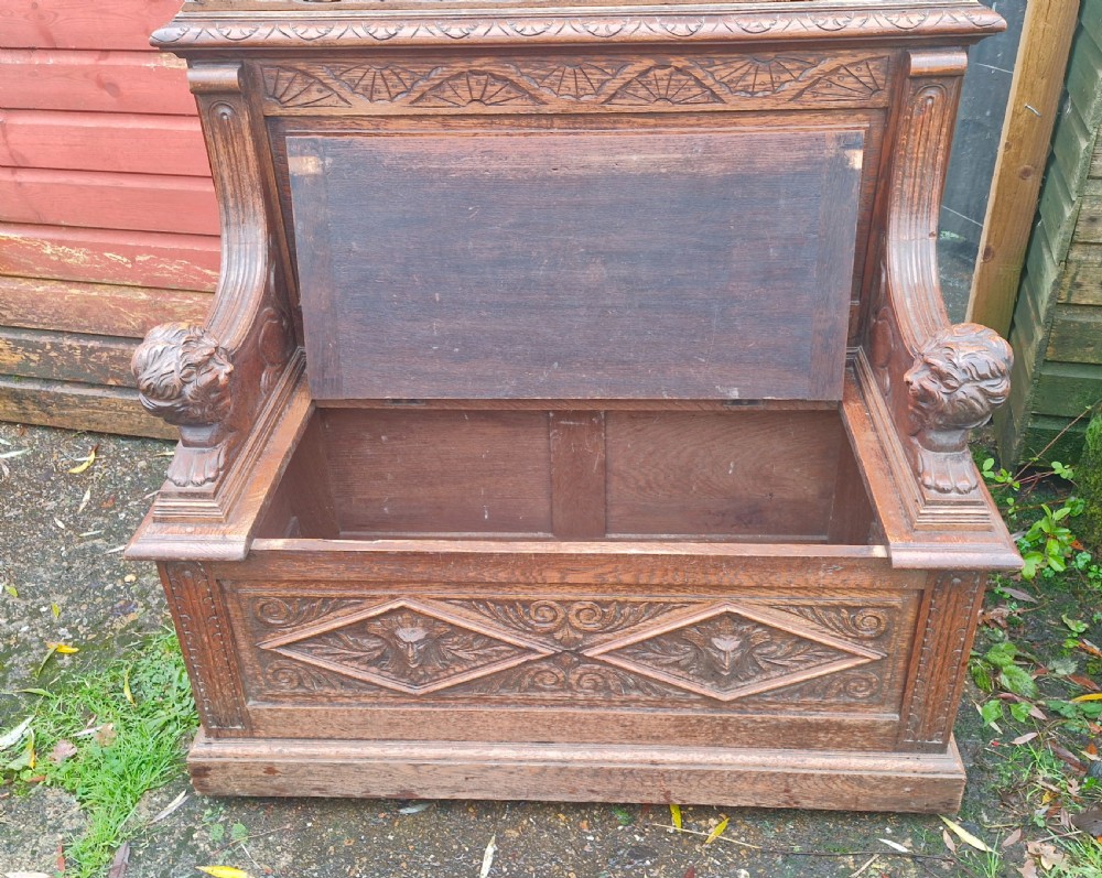 Victorian carved oak hall seat. View X
