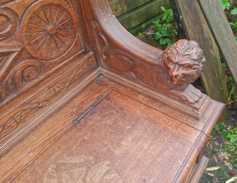 Victorian carved oak hall seat. View XIII