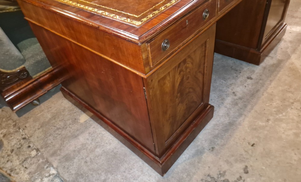 19th century mahogany pedestal partners desk.  View VIII
