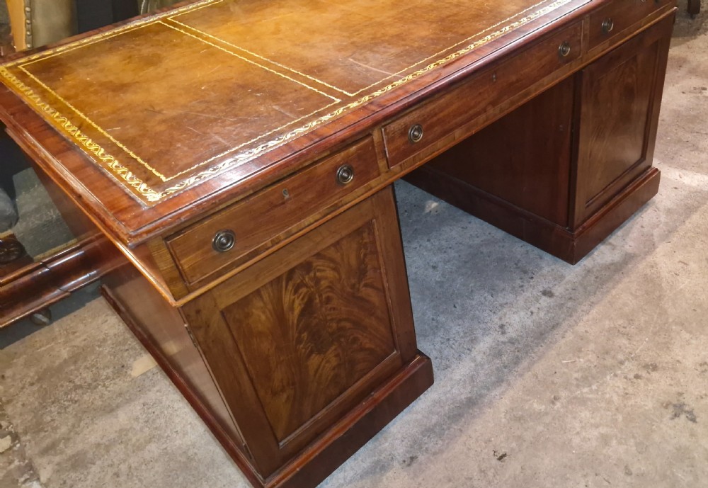 19th century mahogany pedestal partners desk.  View IX