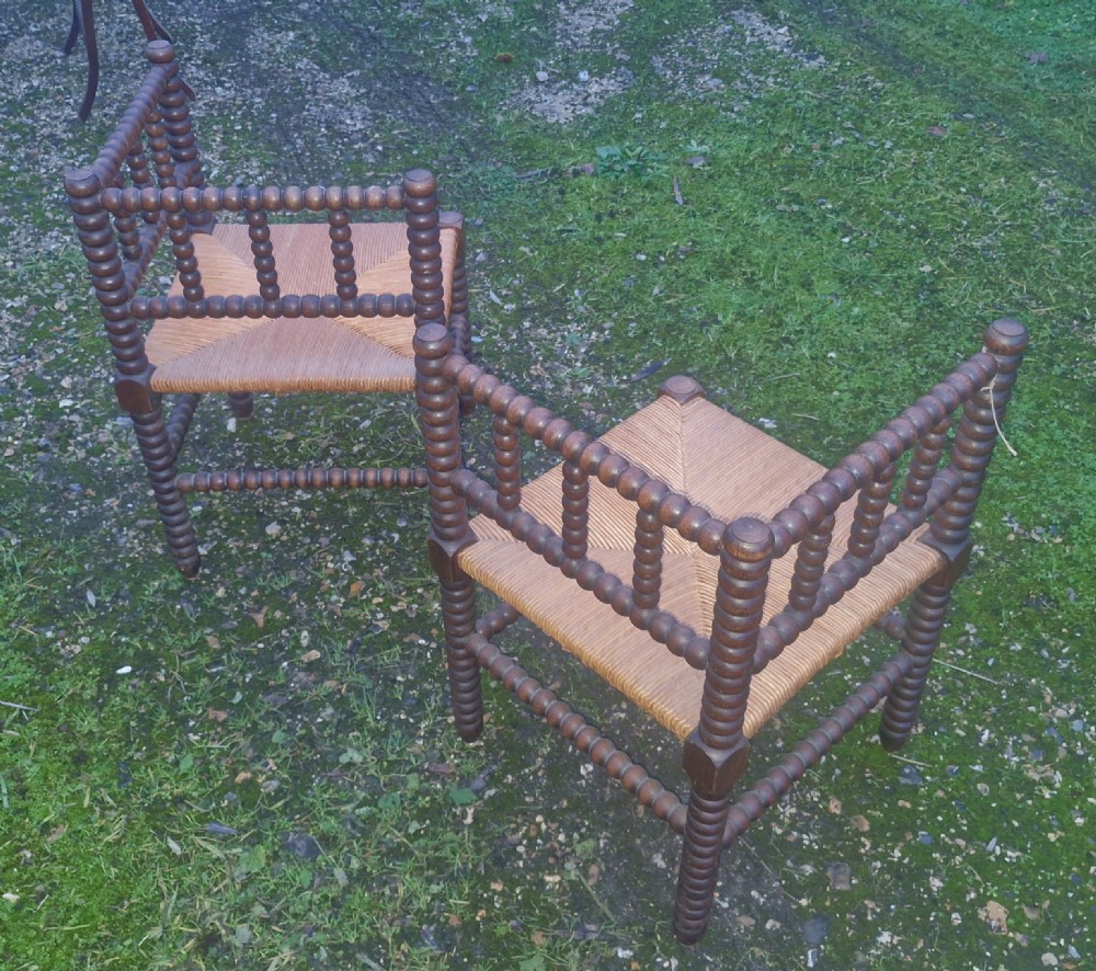 Pair of early 20th century oak bobbin framed corner chairs. View II