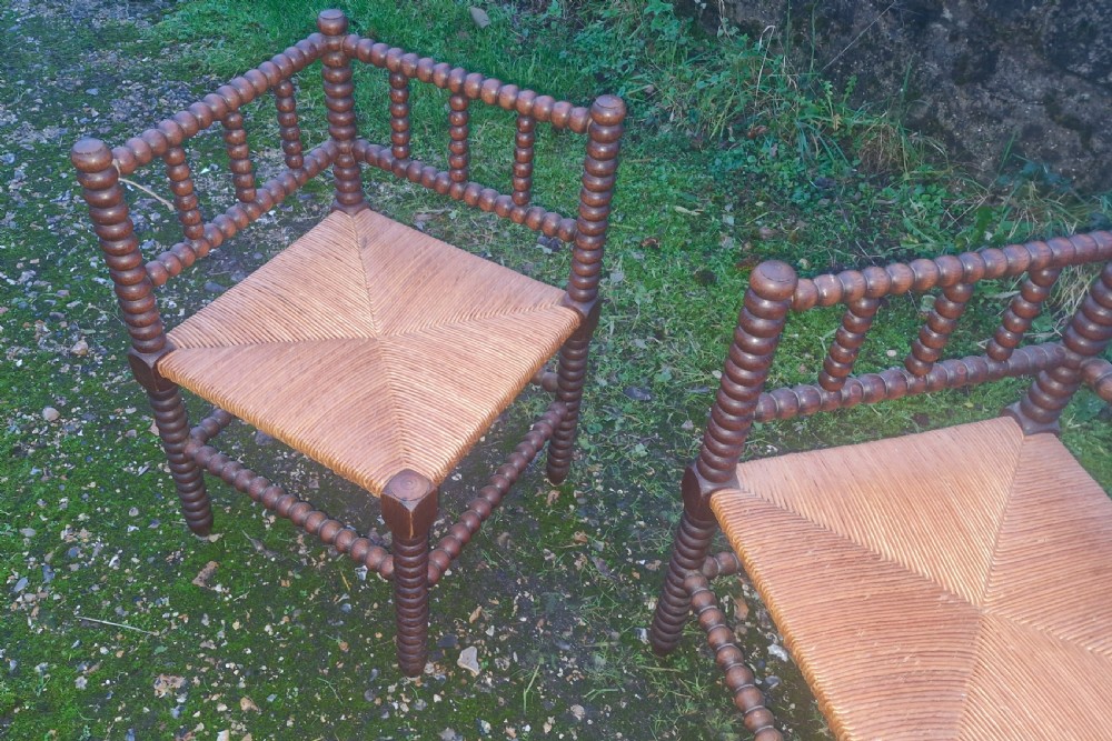 Pair of early 20th century oak bobbin framed corner chairs. View III