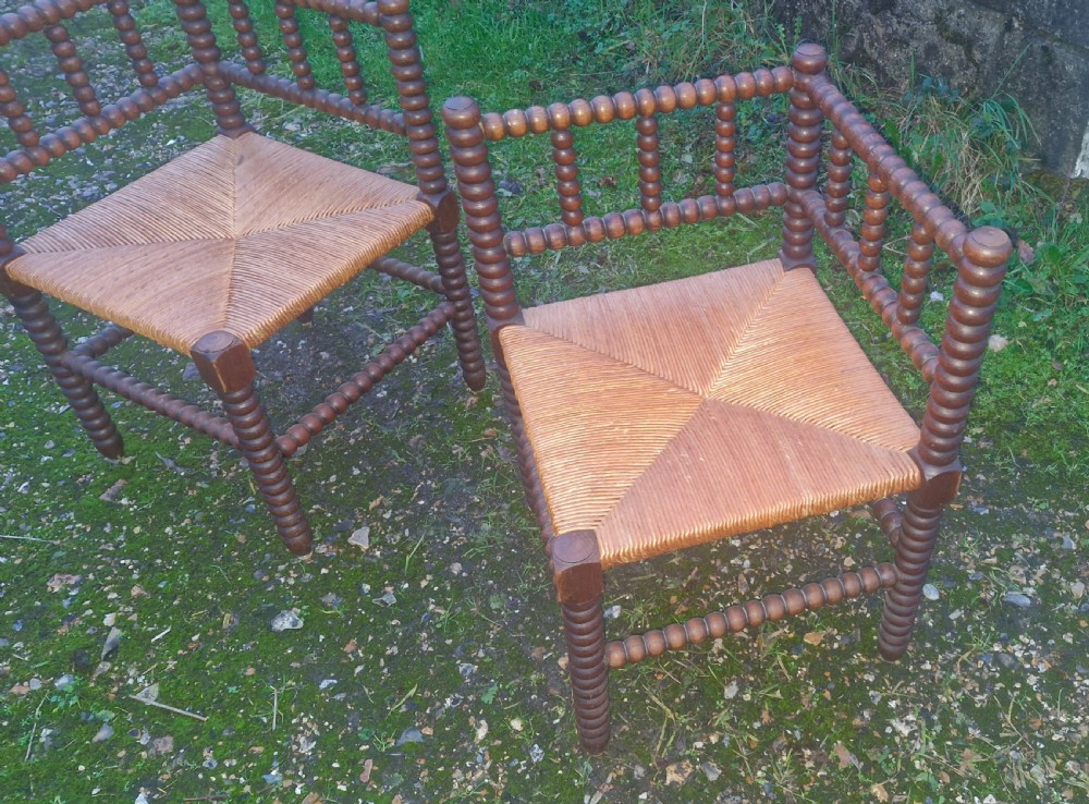 Pair of early 20th century oak bobbin framed corner chairs. View IV