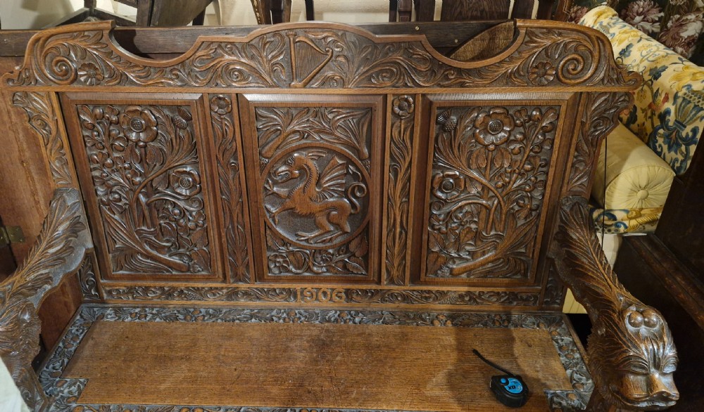 Carved oak Welsh hall seat. View VI