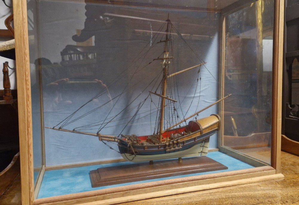 Cased model of a boat. View IX
