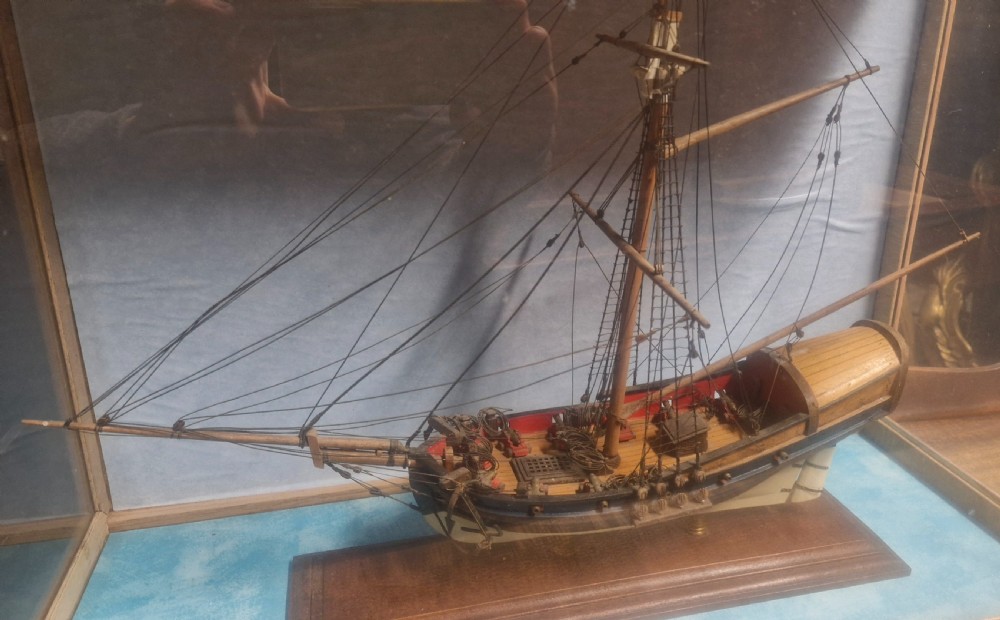 Cased model of a boat. View X