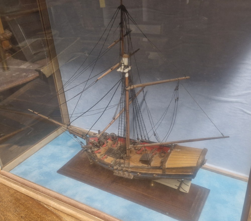 Cased model of a boat. View XIV