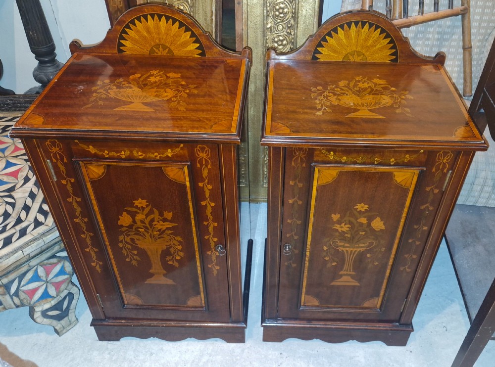 Pair of Edwardian inlaid mahogany bedside cabinets.
