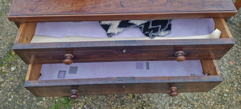 Neat small Regency mahogany chest of drawers.  View III