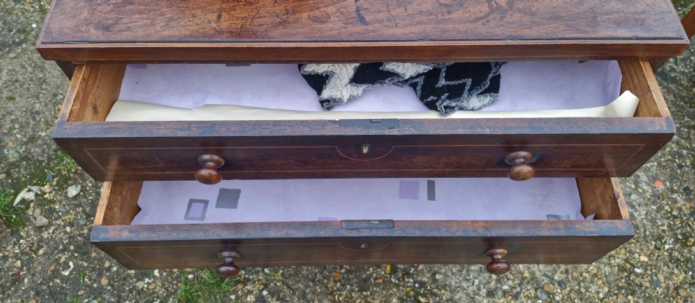 Neat small Regency mahogany chest of drawers.  View IV