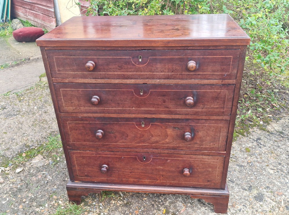 Neat small Regency mahogany chest of drawers.  View VI