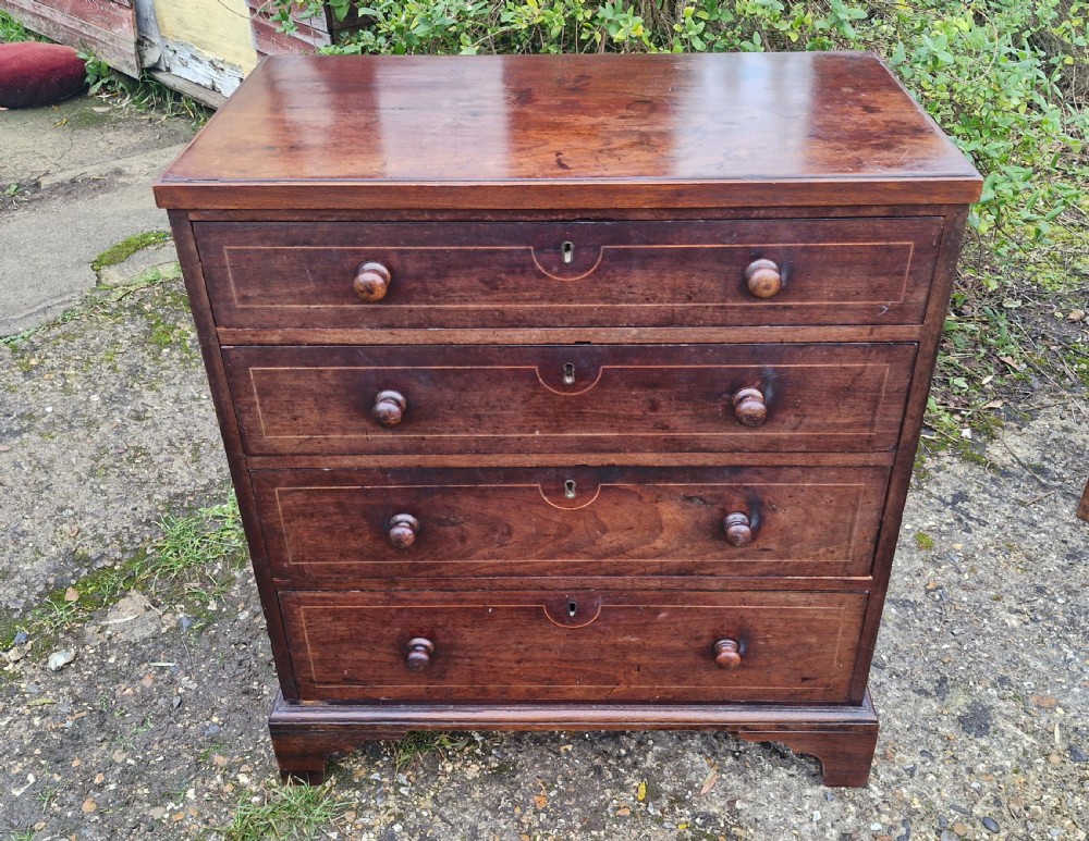 Neat small Regency mahogany chest of drawers.  View VII