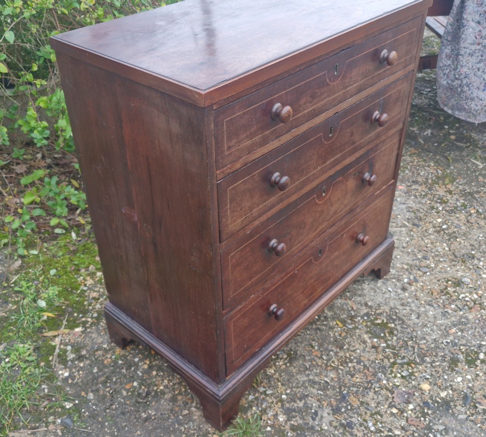 Neat small Regency mahogany chest of drawers.  View VIII