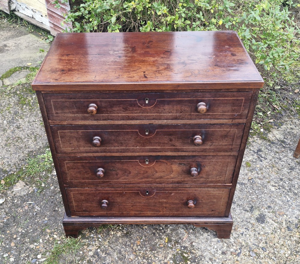 Neat small Regency mahogany chest of drawers.  View IX