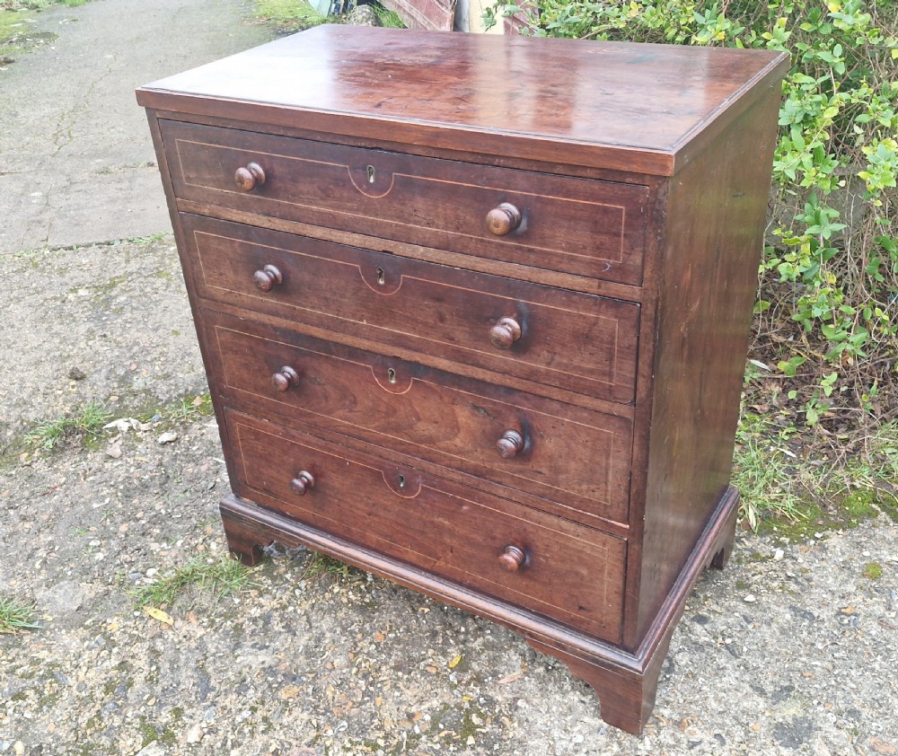 Neat small Regency mahogany chest of drawers.  View X
