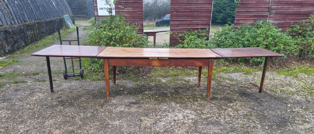 Large French farmhouse house extending dining table. 