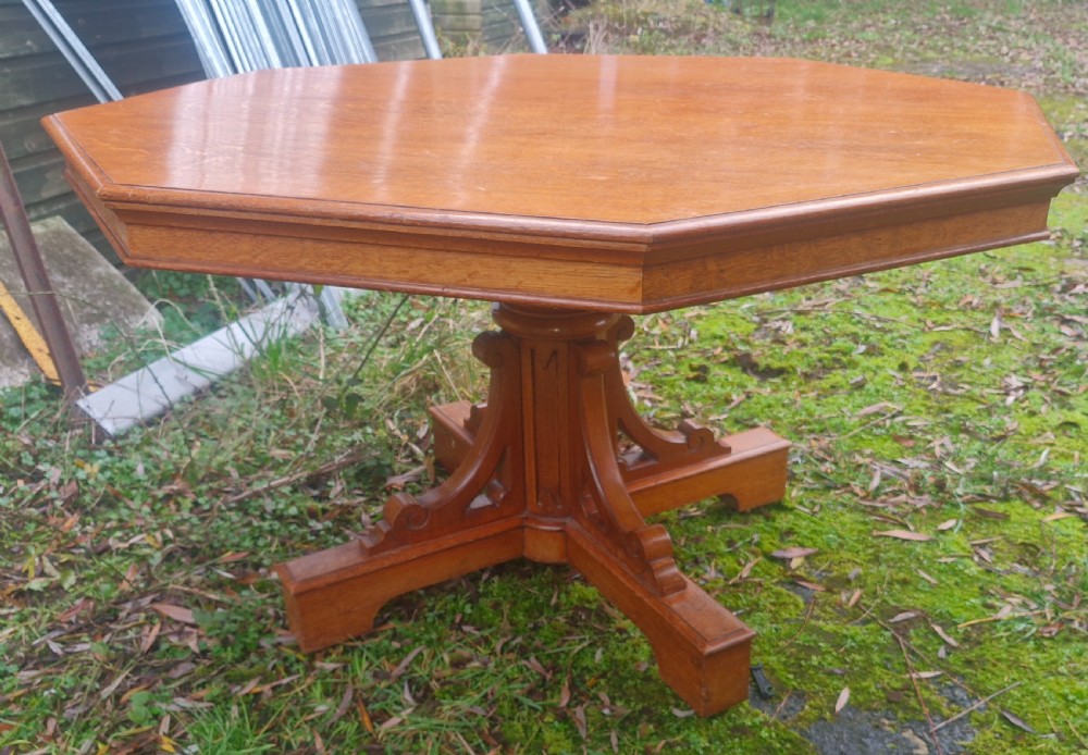 Large Victorian Gothic light oak centre table. 