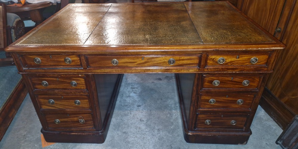 19th century mahogany kneehole pedestal partners desk.  View II