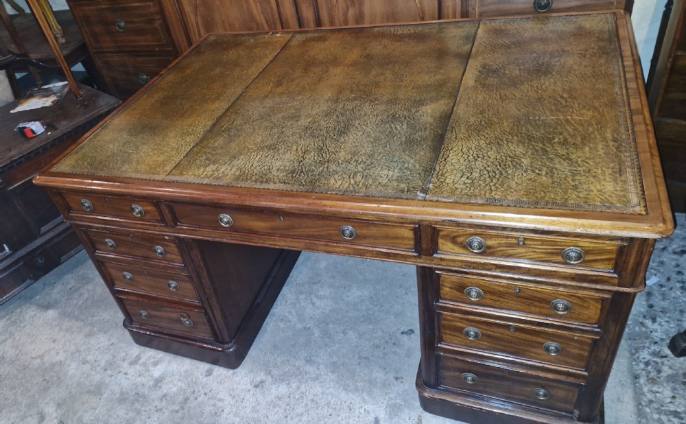 19th century mahogany kneehole pedestal partners desk.  View X