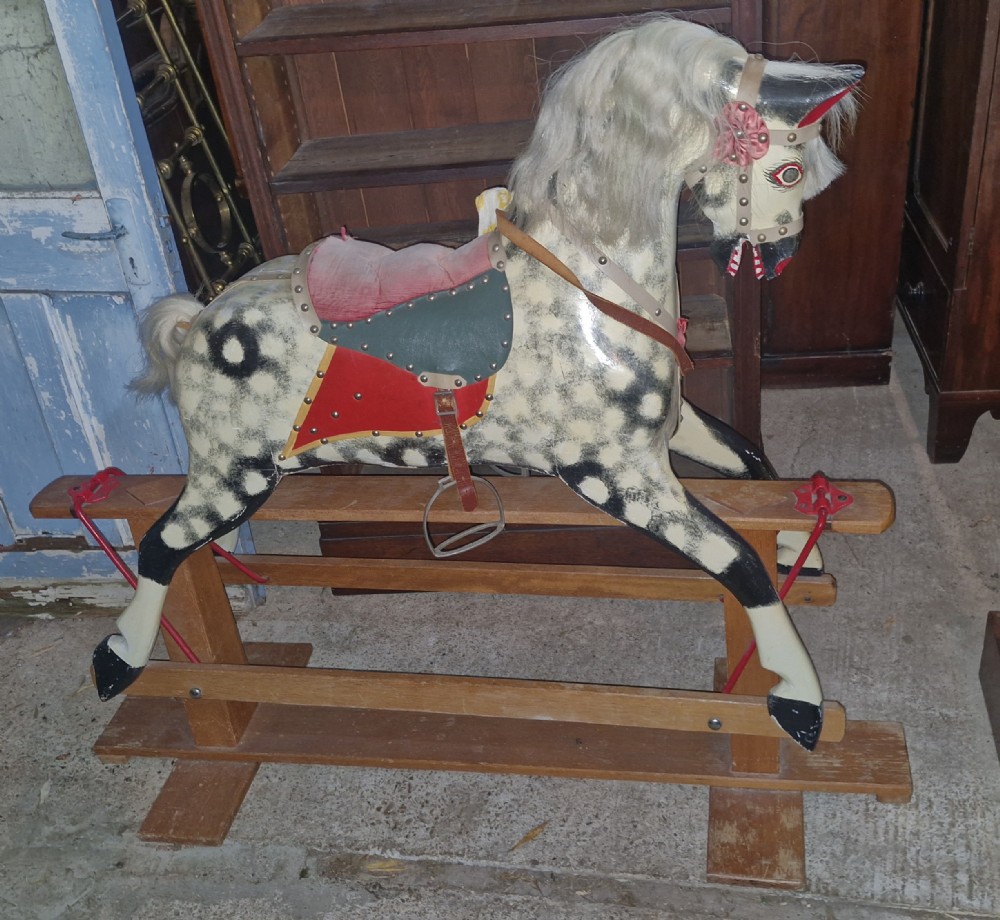 Carved wooden rocking horse. 