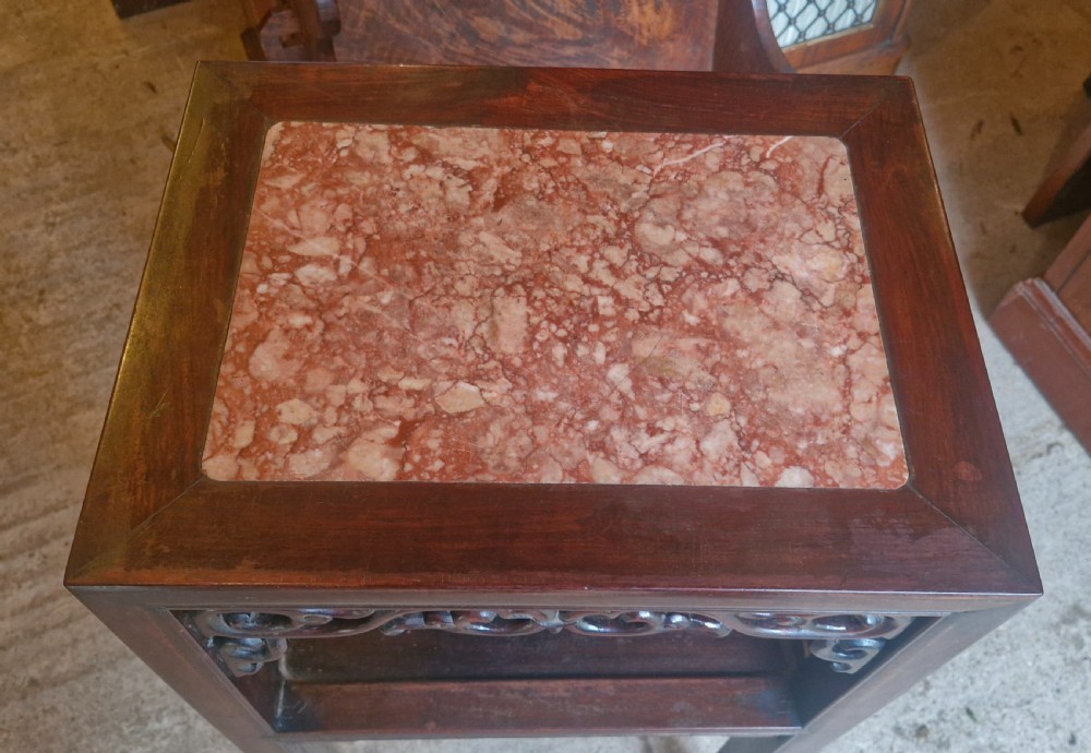 Late 19th century carved Chinese hardwood stand. View II