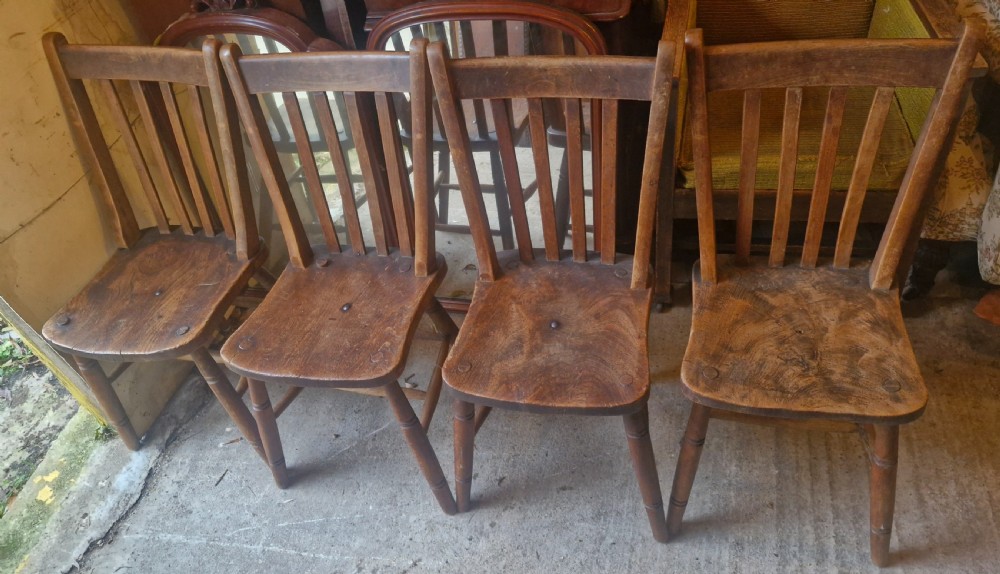 Unusual set of 4 Windsor chairs all with different maker's stamps. View II