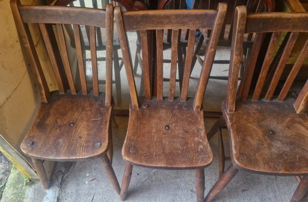 Unusual set of 4 Windsor chairs all with different maker's stamps. View III