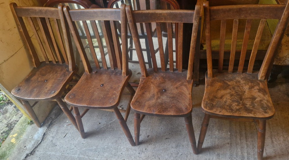 Unusual set of 4 Windsor chairs all with different maker's stamps. View V