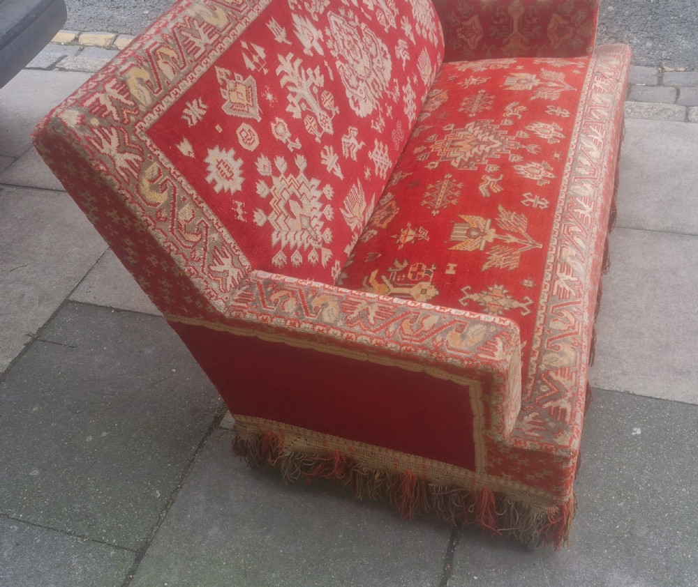 Late 19th century carpet upholstered sofa.  View V
