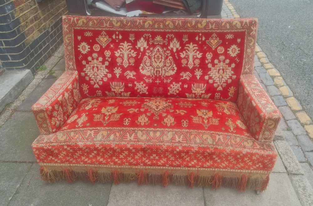 Late 19th century carpet upholstered sofa.  View VII