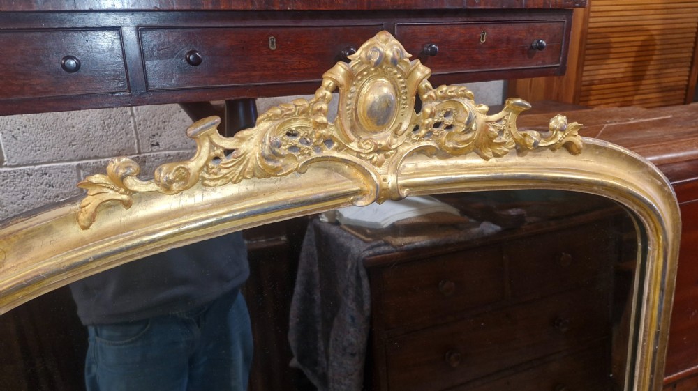 Victorian gilt framed overmantel mirror.  View II