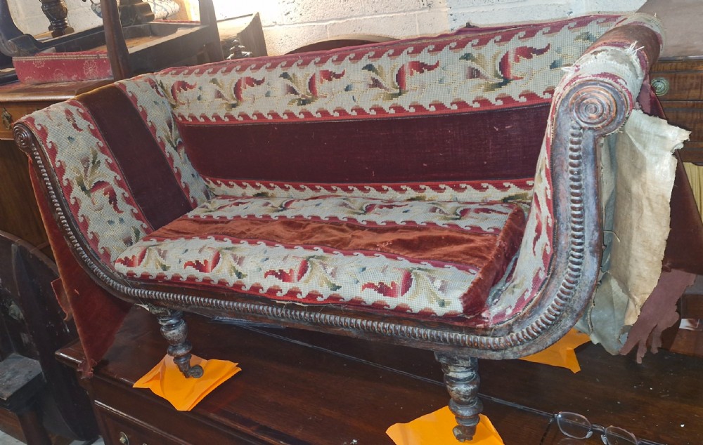 Rare Regency upholstered sofa of child's size. View III