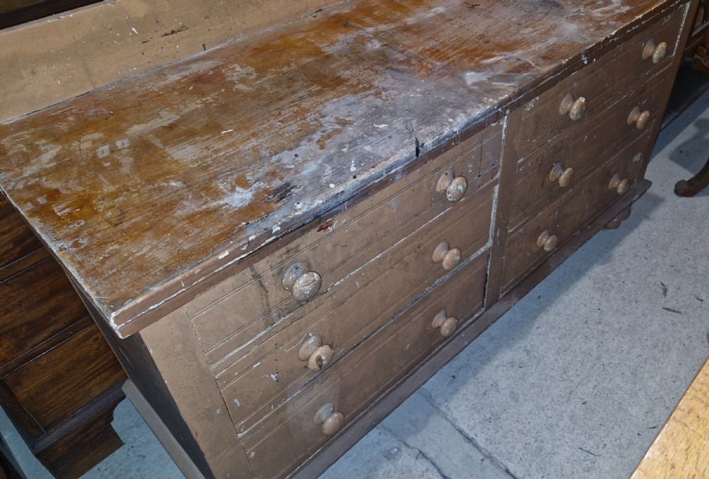 Victorian pine set of haberdashery drawers.  View V