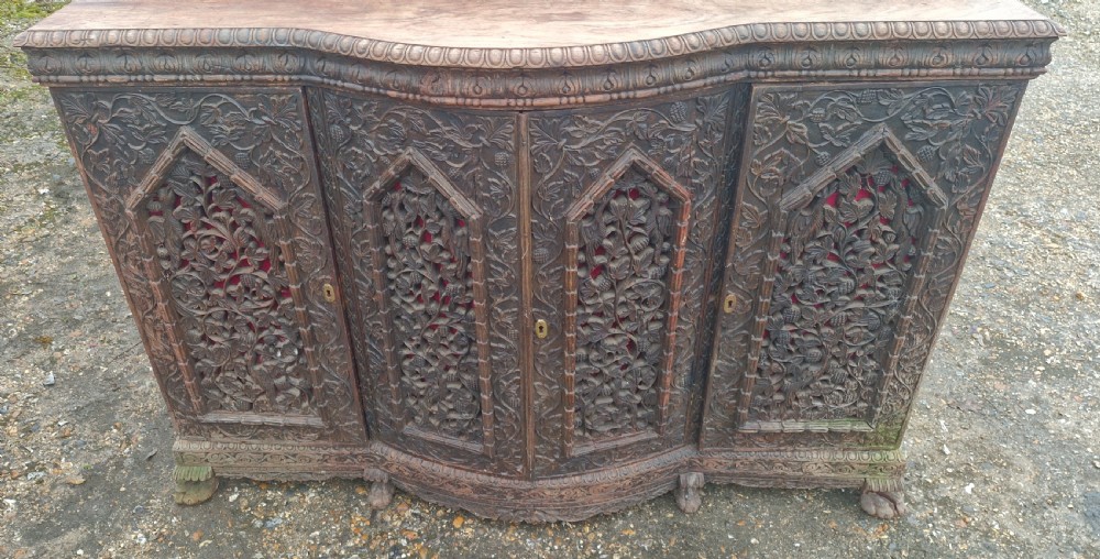 Carved Anglo Indian hardwood 4 door side cabinet.  View IV