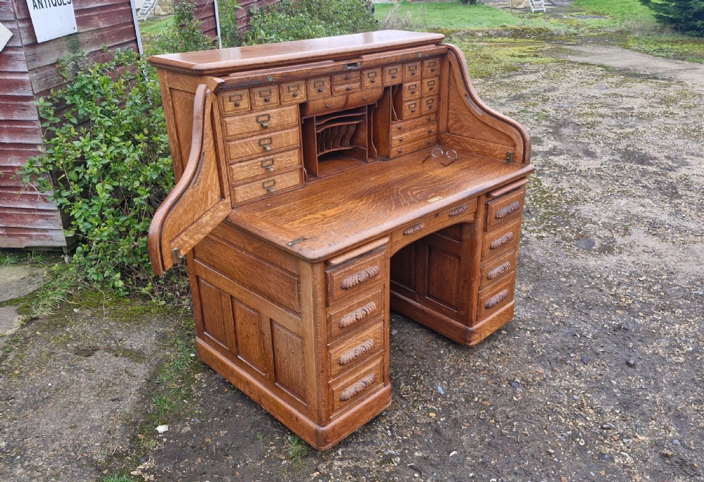 Good oak Roll top pedestal desk. View II