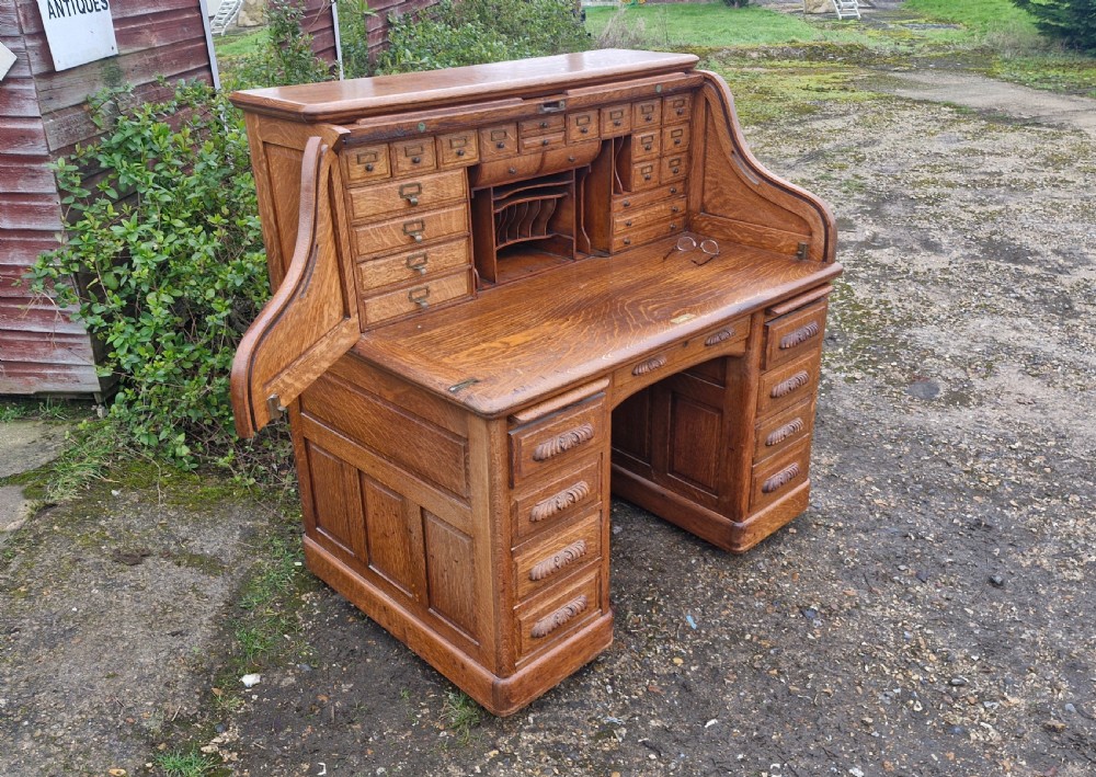 Good oak Roll top pedestal desk. View III