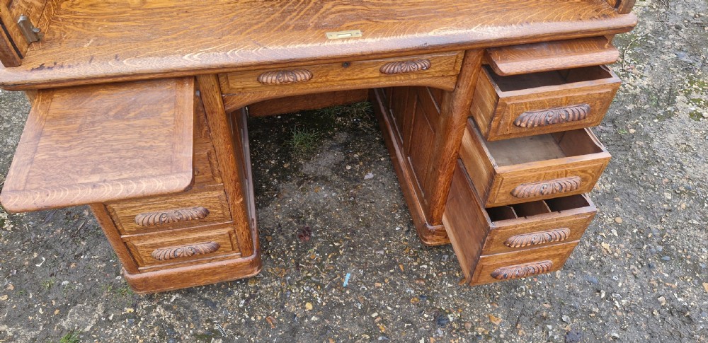 Good oak Roll top pedestal desk. View IV
