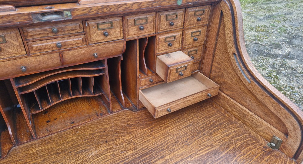 Good oak Roll top pedestal desk. View V