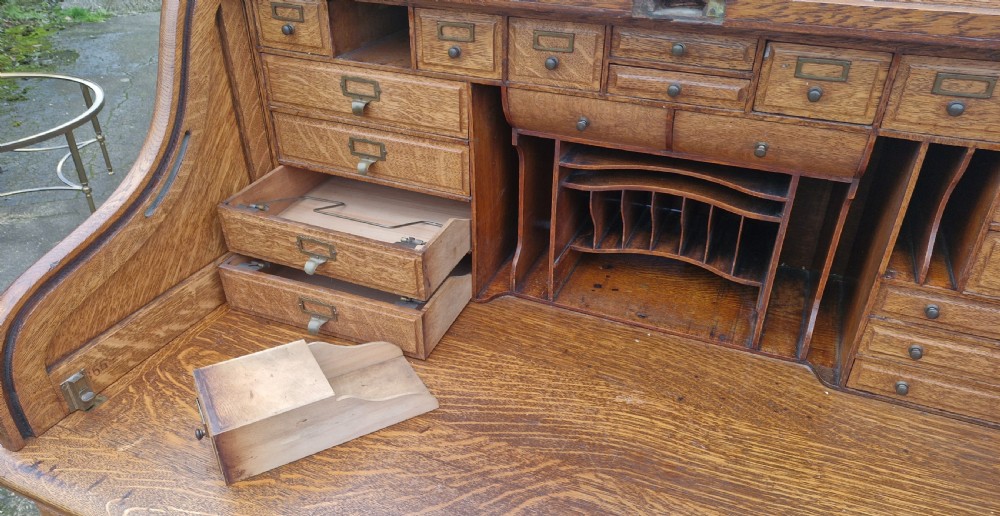 Good oak Roll top pedestal desk. View VI