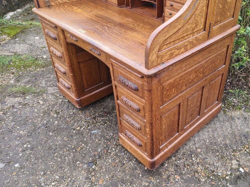 Good oak Roll top pedestal desk. View X