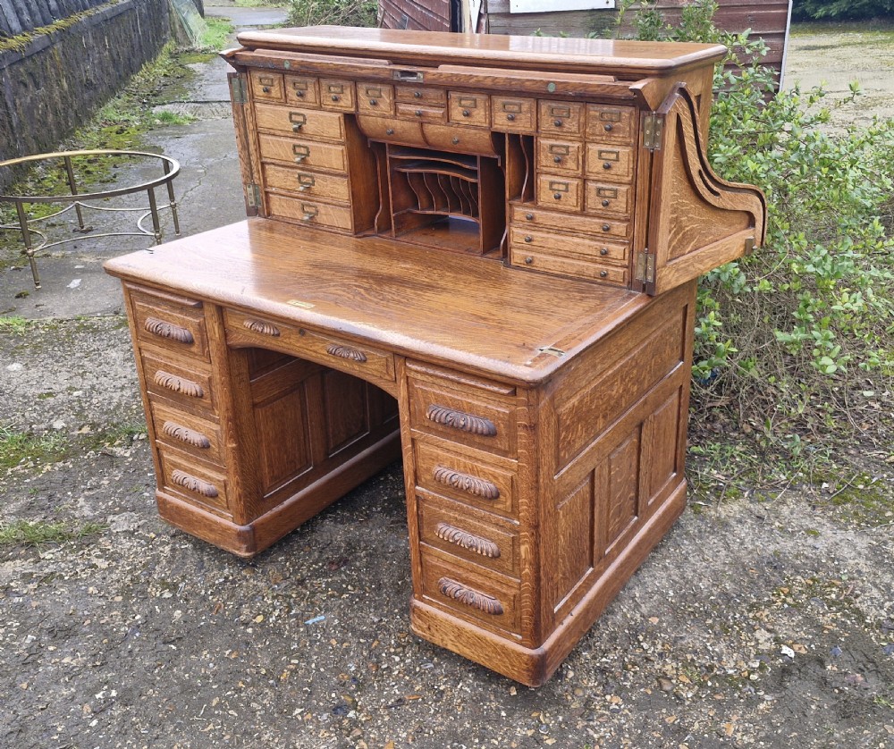 Good oak Roll top pedestal desk. View XII
